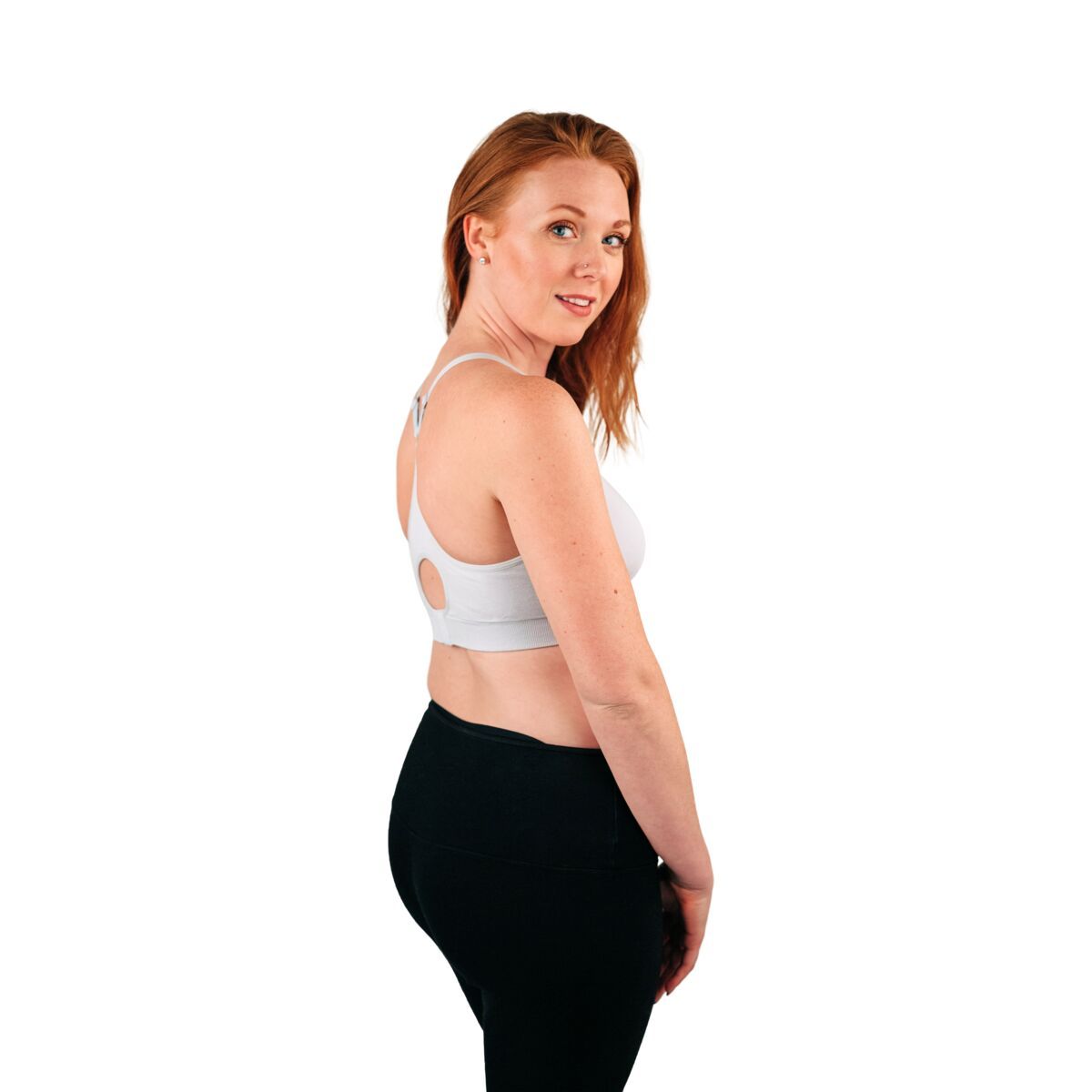 Side of woman wearing gray racerback nursing bra