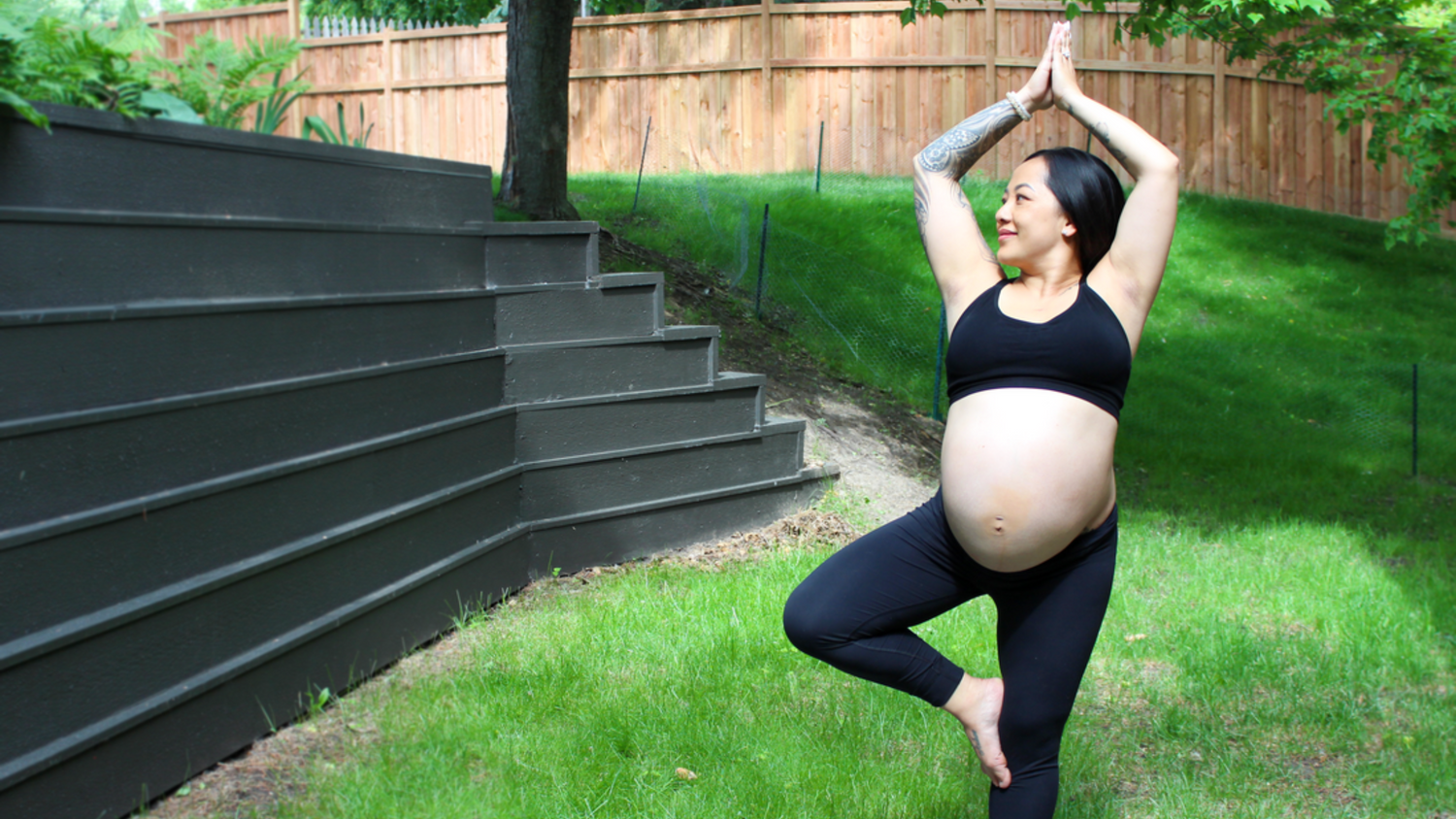 mom doing yoga in bamboobies bra on a summer day